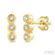 1 10 Ctw Petite Bezel Set Round Cut Diamond Fashion Stud Earring in 10K Yellow Gold For Sale