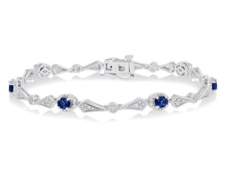 1 10 ctw Oval Cut 4X3MM Sapphire and Round Cut Diamond Precious Bracelet in 10K White Gold For Sale