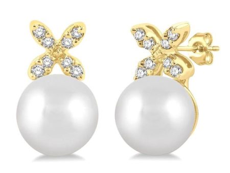 1 20 ctw Petite 4-Petal Flower 5.5 MM Cultured Pearls and Round Cut Diamond Fashion Stud Earring in 10K Yellow Gold For Sale