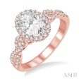 1 2 Ctw Oval Cut Diamond Ladies Engagement Ring with 1 3 Ct Oval Cut Center Stone in 14K Rose and White Gold For Discount