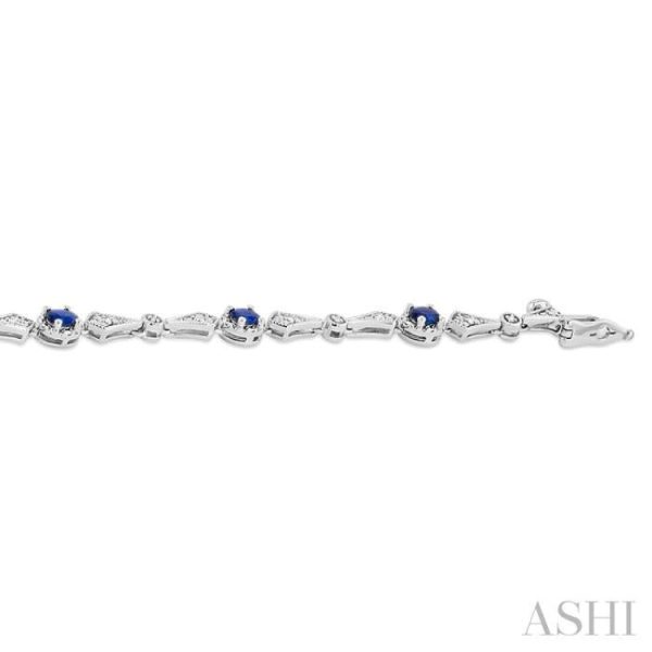 1 10 ctw Oval Cut 4X3MM Sapphire and Round Cut Diamond Precious Bracelet in 10K White Gold For Sale