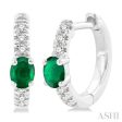 1 10 ctw Petite 4X3 MM Oval Cut Emerald and Round Cut Diamond Fashion Huggies in 10K White Gold on Sale